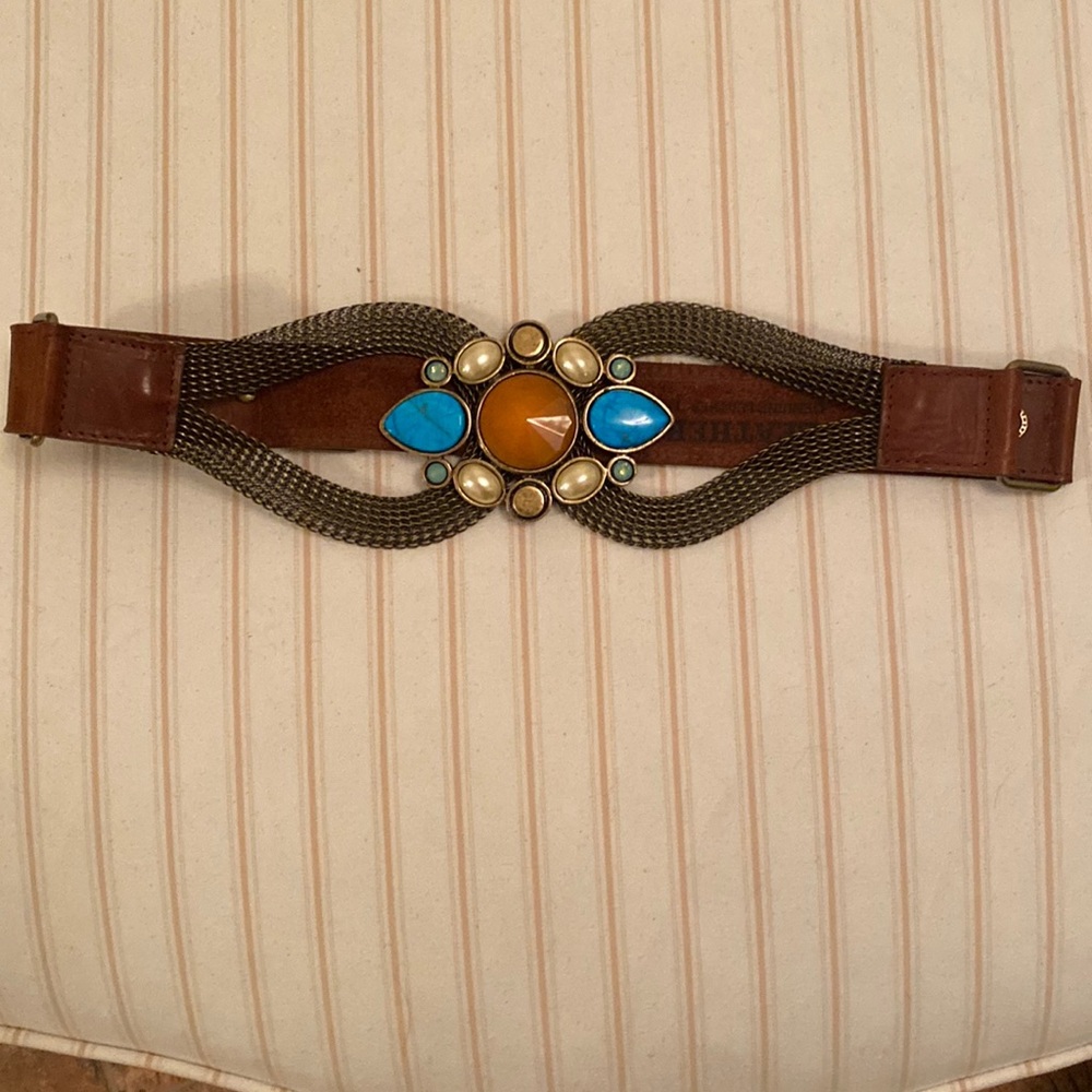 Western style, genuine leather belt, with beautiful stones.  Made in the USA